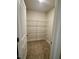 Walk-in closet with multiple levels of wire shelving for optimal organization at 349 Shadow Falls Dr, Wendell, NC 27591