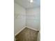 Clean, empty walk-in closet with wire shelving, ready to be filled with storage solutions for optimal organization at 349 Shadow Falls Dr, Wendell, NC 27591