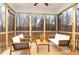 Inviting screened porch is perfect for outdoor relaxation and entertaining at 349 Shadow Falls Dr, Wendell, NC 27591
