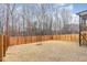 Picture of the backyard of home with a wood fence surrounding the area at 349 Shadow Fls Dr, Wendell, NC 27591