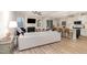 Bright living room featuring a fireplace, a white sofa, and stylish decor at 349 Shadow Falls Dr, Wendell, NC 27591