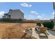 Lawn area featuring an outdoor seating area with patio chairs and a small fire pit at 3512 Dragonfly River Ct, Raleigh, NC 27604
