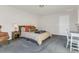 Bedroom with carpet, a double bed and side tables with lamps and a chair at 3512 Dragonfly River Ct, Raleigh, NC 27604