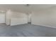 Open-concept living room with carpet and neutral color palette at 3512 Dragonfly River Ct, Raleigh, NC 27604