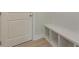 Mudroom with a bench, cubbies and a door to the garage at 3529 Bailey Lk Dr, Fuquay Varina, NC 27526