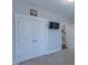 Bedroom featuring double closets and neutral carpeting, ready for relaxation and personalization at 375 Thomas Arnold Rd, Zebulon, NC 27597