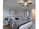 Cozy bedroom with a ceiling fan, gray walls and ample natural light at 375 Thomas Arnold Rd, Zebulon, NC 27597