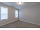 Bedroom with neutral carpeting, bright natural light, and clean trim, ready for personalization at 375 Thomas Arnold Rd, Zebulon, NC 27597