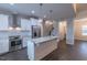 Bright kitchen with stainless steel appliances, granite countertops, and a functional island at 375 Thomas Arnold Rd, Zebulon, NC 27597