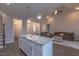 Open concept living space adjacent to kitchen featuring an island with granite countertops at 375 Thomas Arnold Rd, Zebulon, NC 27597