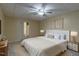 Bedroom boasts a ceiling fan, and natural light, complete with an adjoining bathroom for added privacy at 375 Thomas Arnold Rd, Zebulon, NC 27597