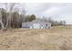 View of the outbuilding with ample yard space at 375 Thomas Arnold Rd, Zebulon, NC 27597