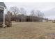View of a big yard with wooded views at 375 Thomas Arnold Rd, Zebulon, NC 27597