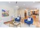 Bright living room with hardwood floors, modern art, and an open floor plan at 415 Westbury Dr, Chapel Hill, NC 27516