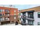 Apartment balconies with seating overlooking the neighborhood at 615 Daniels St # 318, Raleigh, NC 27605