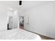 Clean bedroom design with wood floors and a view to other rooms of the house at 615 Daniels St # 318, Raleigh, NC 27605