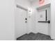 Hallway entrance to apartment #318 and nearby emergency exit at 615 Daniels St # 318, Raleigh, NC 27605