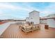 Rooftop deck with outdoor seating, wood flooring, and built-in grills at 615 Daniels St # 318, Raleigh, NC 27605