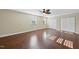 A bedroom with two large closets, two windows, and hardwood floors ready for relaxation at 6423 New Market Way, Raleigh, NC 27615