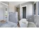 Bathroom with soaking tub, glass shower, and stylish fixtures, offering a spa-like experience at 6509 Zebulon Rd, Wake Forest, NC 27587