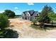 New modern farmhouse with inviting front porch at 6509 Zebulon Rd, Wake Forest, NC 27587