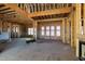 Spacious framed living room with many windows and a gas fireplace at 6509 Zebulon Rd, Wake Forest, NC 27587