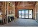 Framed living room showcasing a fireplace and glass doors for great natural light at 6509 Zebulon Rd, Wake Forest, NC 27587
