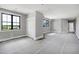 Bright living room with closet and ample natural light from two windows with outside view at 6509 Zebulon Rd, Wake Forest, NC 27587
