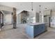 Open floor plan featuring a kitchen with a central island and living room at 6509 Zebulon Rd, Wake Forest, NC 27587