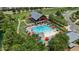 Aerial view of the community pool surrounded by colorful umbrellas with easy access to the pool house at 729 Daniel Ridge Rd, Wendell, NC 27591
