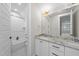 Charming bathroom showcasing a granite-topped vanity and a tiled shower and tub combo at 729 Daniel Ridge Rd, Wendell, NC 27591