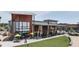 Charming commercial building featuring modern design and inviting outdoor seating areas at 729 Daniel Ridge Rd, Wendell, NC 27591