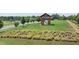 Scenic community park boasting lush greenery, walking paths, and a charming wooden gazebo at 729 Daniel Ridge Rd, Wendell, NC 27591