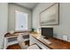 Functional home office boasts built-in desk, sleek design, natural light, perfect for remote work or study at 729 Daniel Ridge Rd, Wendell, NC 27591