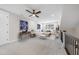 Bright living room offers comfortable seating, elegant decor, and natural light from a large window at 729 Daniel Ridge Rd, Wendell, NC 27591