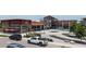 Exterior of retail shops, with outdoor seating and ample parking, with pedestrian friendly walkways at 729 Daniel Ridge Rd, Wendell, NC 27591
