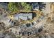 Aerial view showcasing a multi-Gathering complex with ample parking and lush greenery at 7712 Falcon Rest Cir, Raleigh, NC 27615