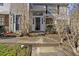 Covered front entrance with glass door and sidelights at 7712 Falcon Rest Cir, Raleigh, NC 27615