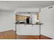 Spacious kitchen with stainless steel appliances and a breakfast bar at 7712 Falcon Rest Cir, Raleigh, NC 27615
