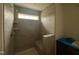 New bathroom featuring gray tile and a corner shower with a built-in bench seat at 79 Willow Cameron Way, Angier, NC 27501