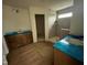 Bathroom featuring a tiled shower, white cabinets, and a separate sink at 79 Willow Cameron Way, Angier, NC 27501