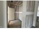 Interior entryway with a doorway leading outside and prepped drywall walls at 79 Willow Cameron Way, Angier, NC 27501