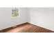 Bedroom with hardwood floors and natural light at 809 S Plum St, Durham, NC 27701