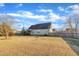 Back yard with fire pit and wood fence at 8116 Hartwood Glen Cir, Willow Springs, NC 27592