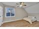 Bright bedroom with large window and hardwood flooring at 8116 Hartwood Glen Cir, Willow Springs, NC 27592
