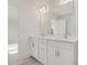 Modern bathroom with double vanity, bright lighting, and lots of storage at 89 Willow Cameron Way, Angier, NC 27501