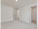 Bright bedroom features carpeted floors, neutral paint, and an ensuite bathroom for convenience at 89 Willow Cameron Way, Angier, NC 27501