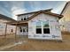 Exterior of new construction home with covered patio at 89 Willow Cameron Way, Angier, NC 27501