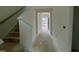 New home hallway with stairs and view to front door at 89 Willow Cameron Way, Angier, NC 27501