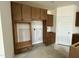 Kitchen features beautifully crafted cabinets for appliances and storage at 89 Willow Cameron Way, Angier, NC 27501